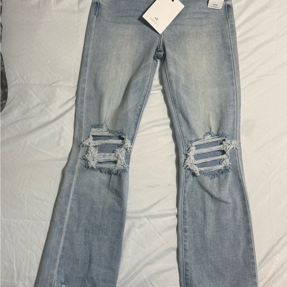Light Blue Distressed Wide-Leg Jeans — Women’s Flare